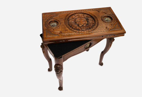 Lion backgammon table opening to reveal the playing field, angled view of the carved lion legs