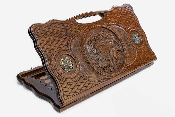 Carved beechwood backgammon board with the Armenian coat of arms and bronze roundels, propped open
