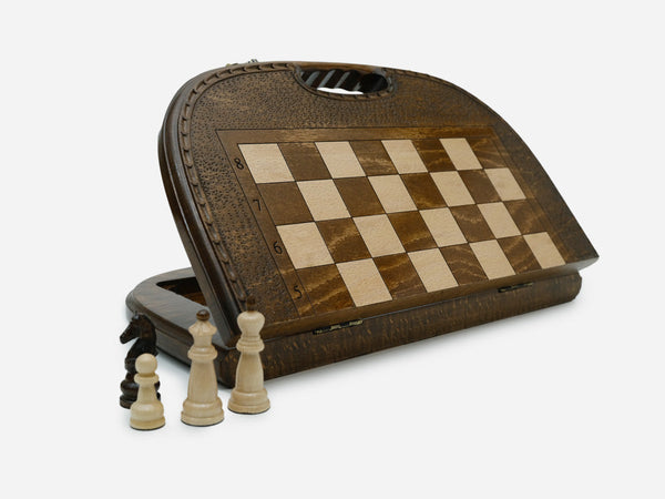 Arched-top folding chess backgammon set standing open, showing the chess face and built-in carry handle