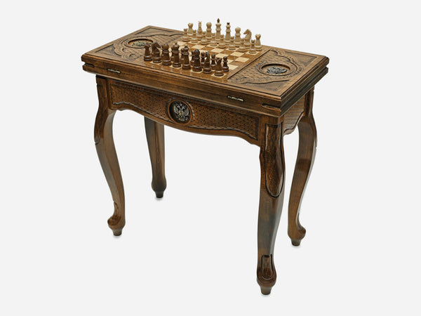 Russian chess and backgammon table with coat of arms, set up for chess, angled view