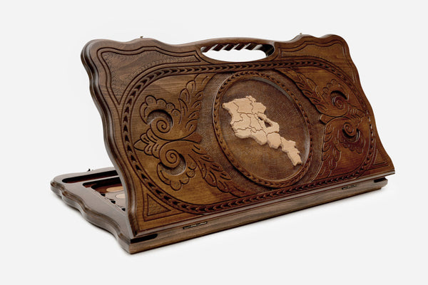 Carved Armenian backgammon board with the map of Armenia and a cut-out carry handle, propped open