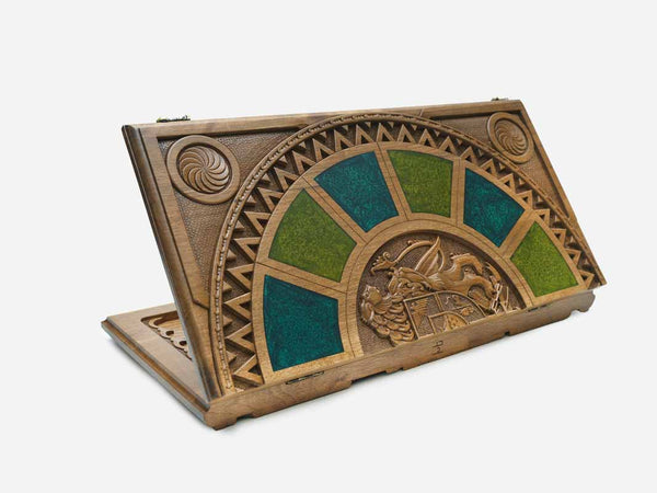 Folding walnut backgammon board standing open, with green and turquoise epoxy panels around the carved Armenian coat of arms