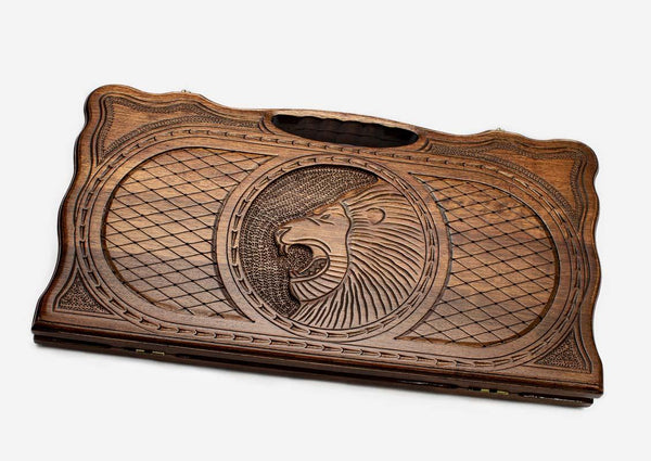 Beechwood backgammon board carved with a roaring lion in a diamond lattice