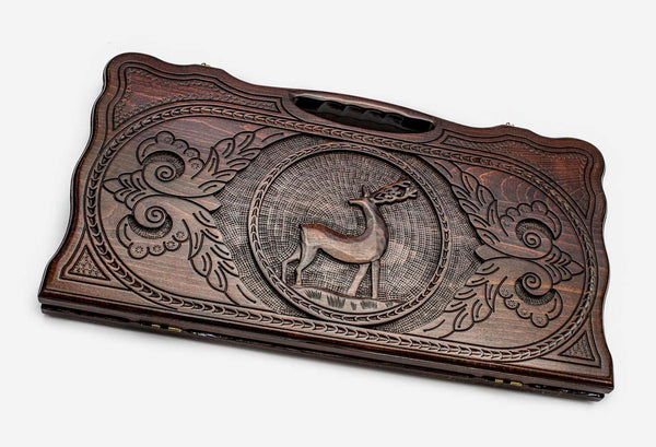 Carved beechwood backgammon board with a graceful deer and carry handle, propped open