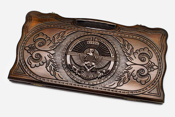 Carved beechwood backgammon board with the Artsakh coat of arms and a carry handle, propped open