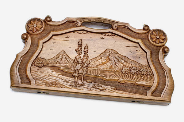 Master-carved walnut backgammon board with an ornately framed Mount Ararat landscape, propped open