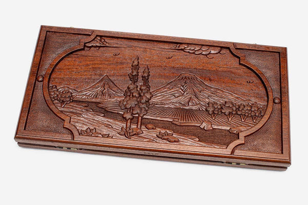Master-carved oak backgammon board with a landscape of Mount Ararat, propped open