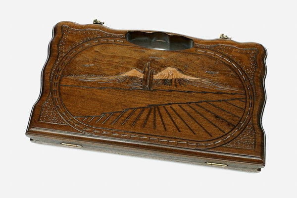 Compact carved backgammon board with Mount Ararat and a carry handle, propped open