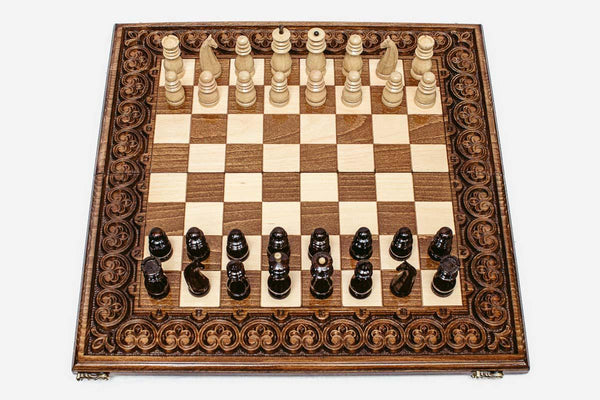 Luxury chess set with hand-carved floral ornament border