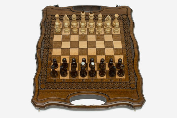 Travel chess set with hand-cut lattice and backgammon inside