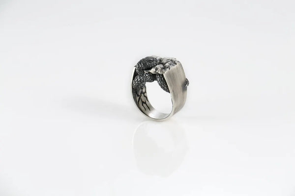 Handcrafted sterling silver snake ring with detailed reptile design