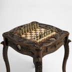 Carved eagle-head leg detail of the luxury chess table