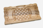 Angled view of the fully carved interlace backgammon board