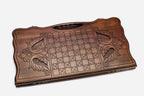 Close-up of the carved Ossetian snow leopard emblem
