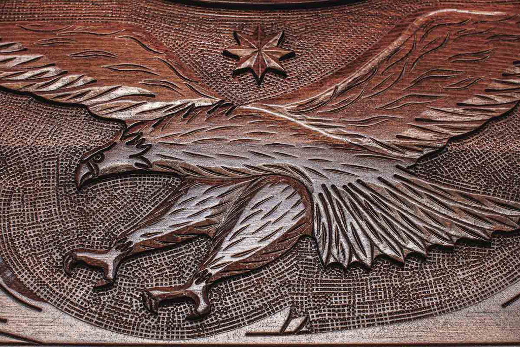 The backgammon board opened to show the wooden playing surface