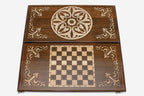 Close-up of the carved Armenian ornament lifted pale against the wood