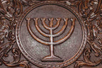 Angled view of the Menorah and Star of David carved backgammon board