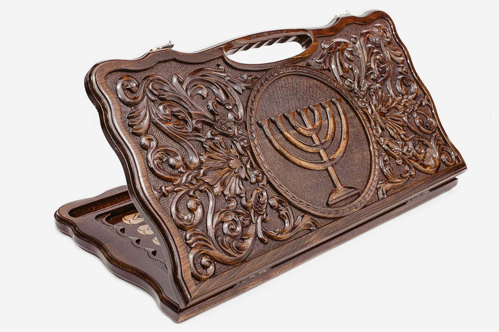 Carved beechwood backgammon board with a Menorah medallion and a carry handle, propped open