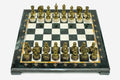 Green and cream marble chess set with hand-cast bronze pieces arranged for play and brass coordinate markers