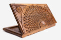 Master-carved walnut backgammon board with a woven infinity fan design, propped open
