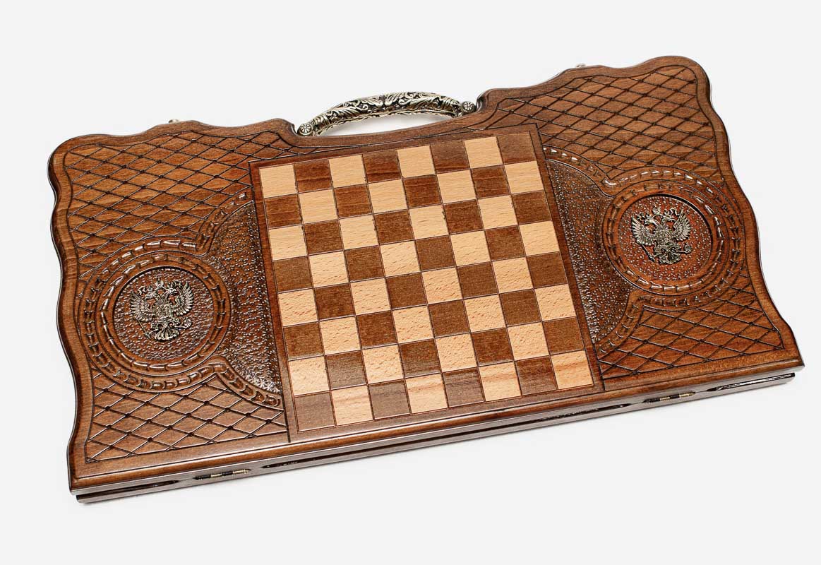 The ornate bronze carry handle