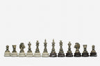 Overhead view of the bronze chess pieces set in the satin-lined storage box
