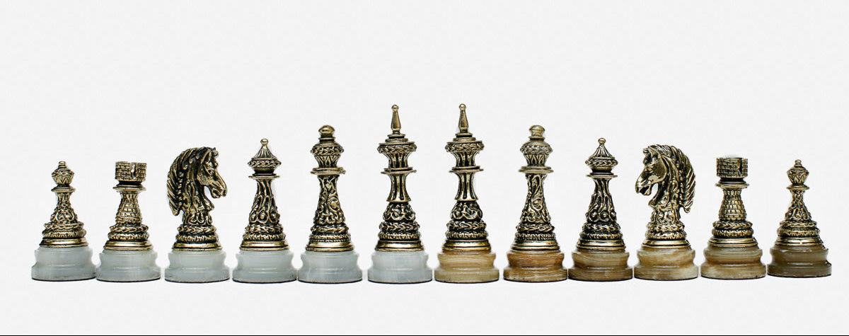 Golden marble chess board framed in warm veined stone