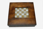 Detail of the golden marble chess set with bronze pieces