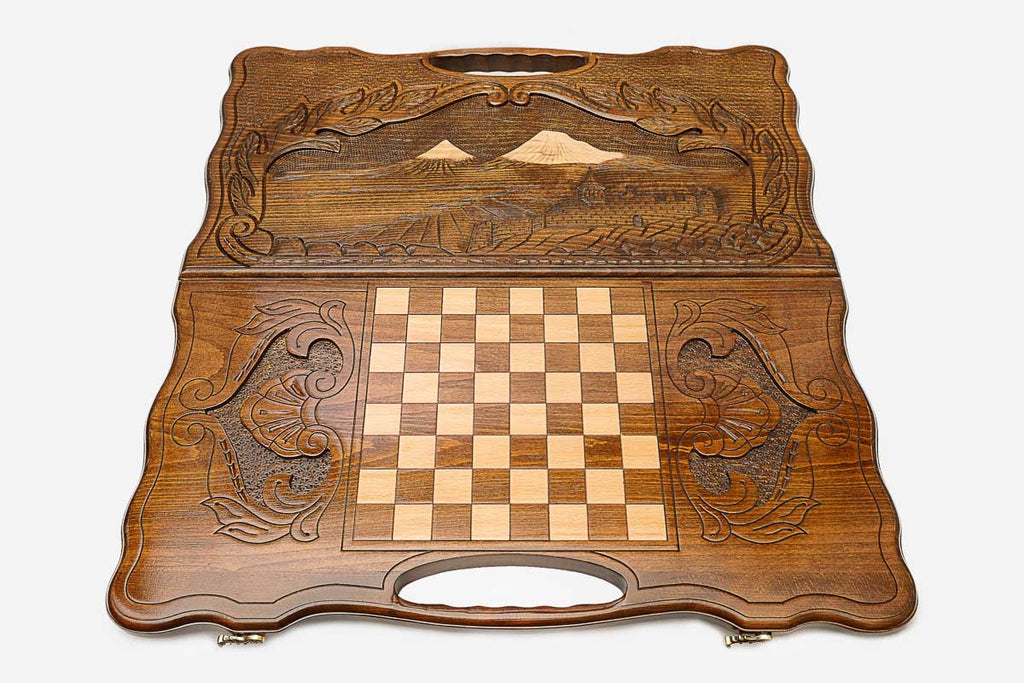 Angled view of the Ararat sunrise carved backgammon board