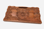 The backgammon board opened to show the wooden playing surface