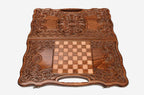 Angled view of the baroque ornament carved backgammon board