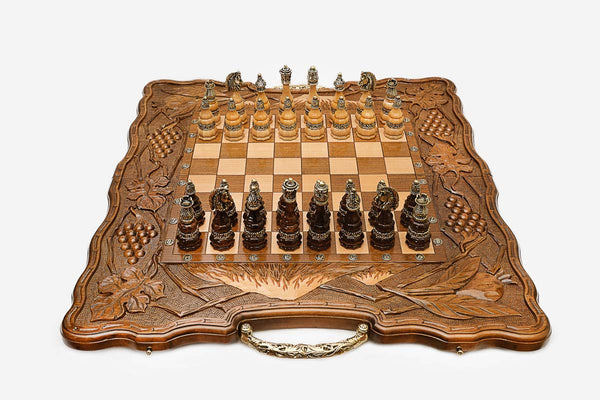 Luxury Armenian chess set with bronze pieces over carved Mount Ararat