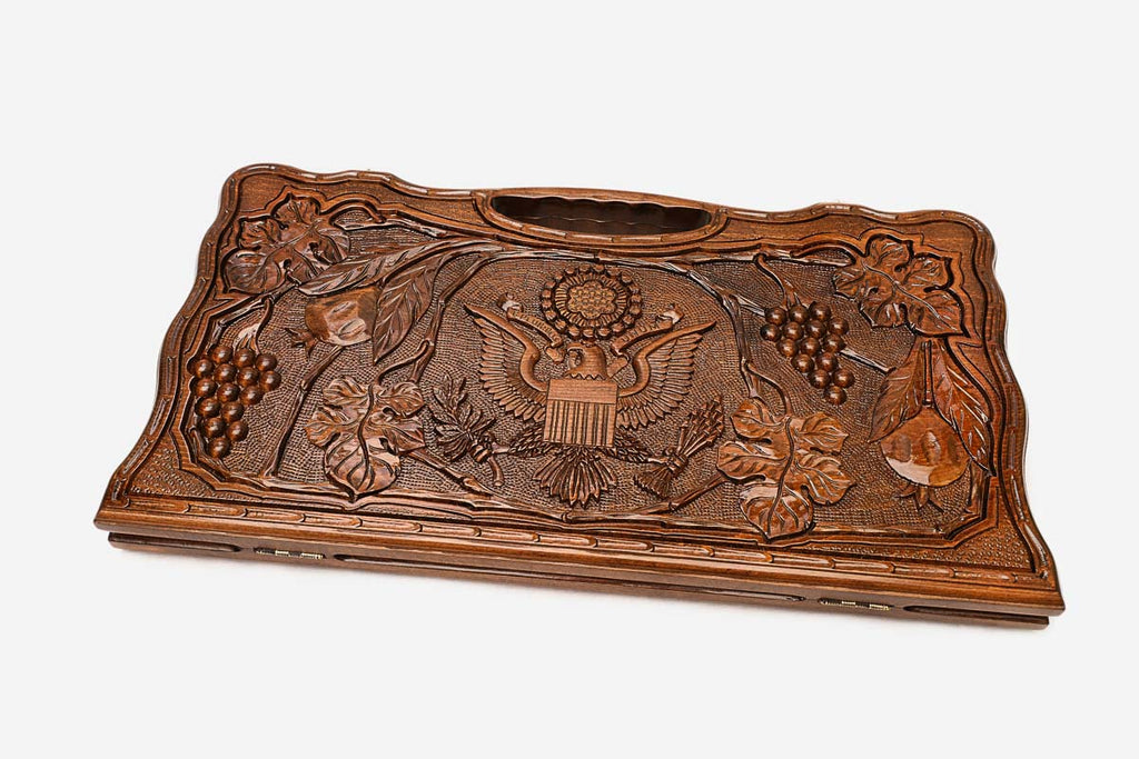 The backgammon board opened to show the wooden playing surface
