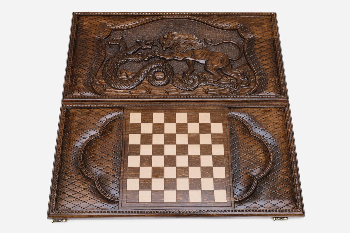 Lion and dragon backgammon set folded, carved beasts showing