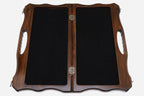 The board opened to show its felt-lined interior compartments and metal clasps