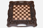 Angled view of the carved folding chess set with its beech and walnut pieces