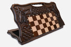 Luxury carved chess set standing open, showing the playing field, woven ornament carving and built-in carry handle