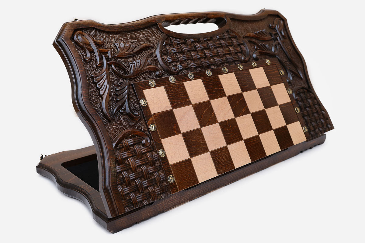 Luxury carved chess set standing open, showing the playing field, woven ornament carving and built-in carry handle
