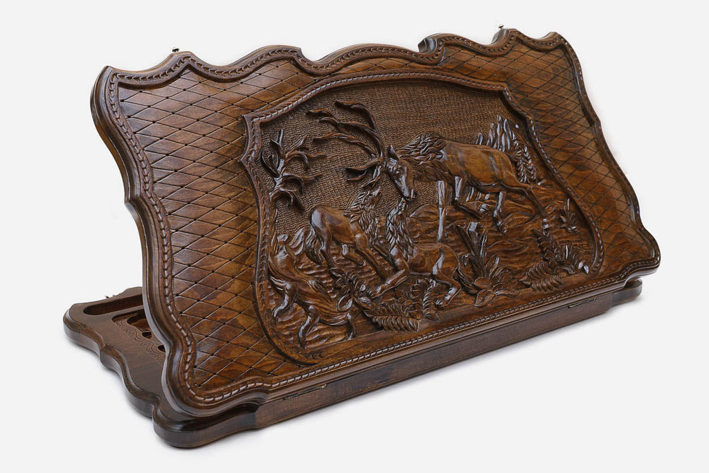 Wooden backgammon set hand carved with a deer and wolf chase