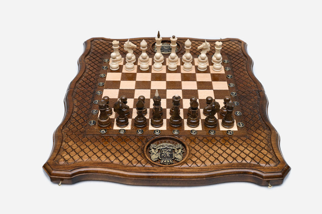 Luxury Georgian chess set with the coat of arms carved at center