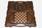Angled view of the lion and spider carved backgammon board