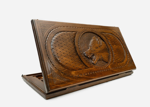 Wooden backgammon set hand carved with a wolf beneath a full moon