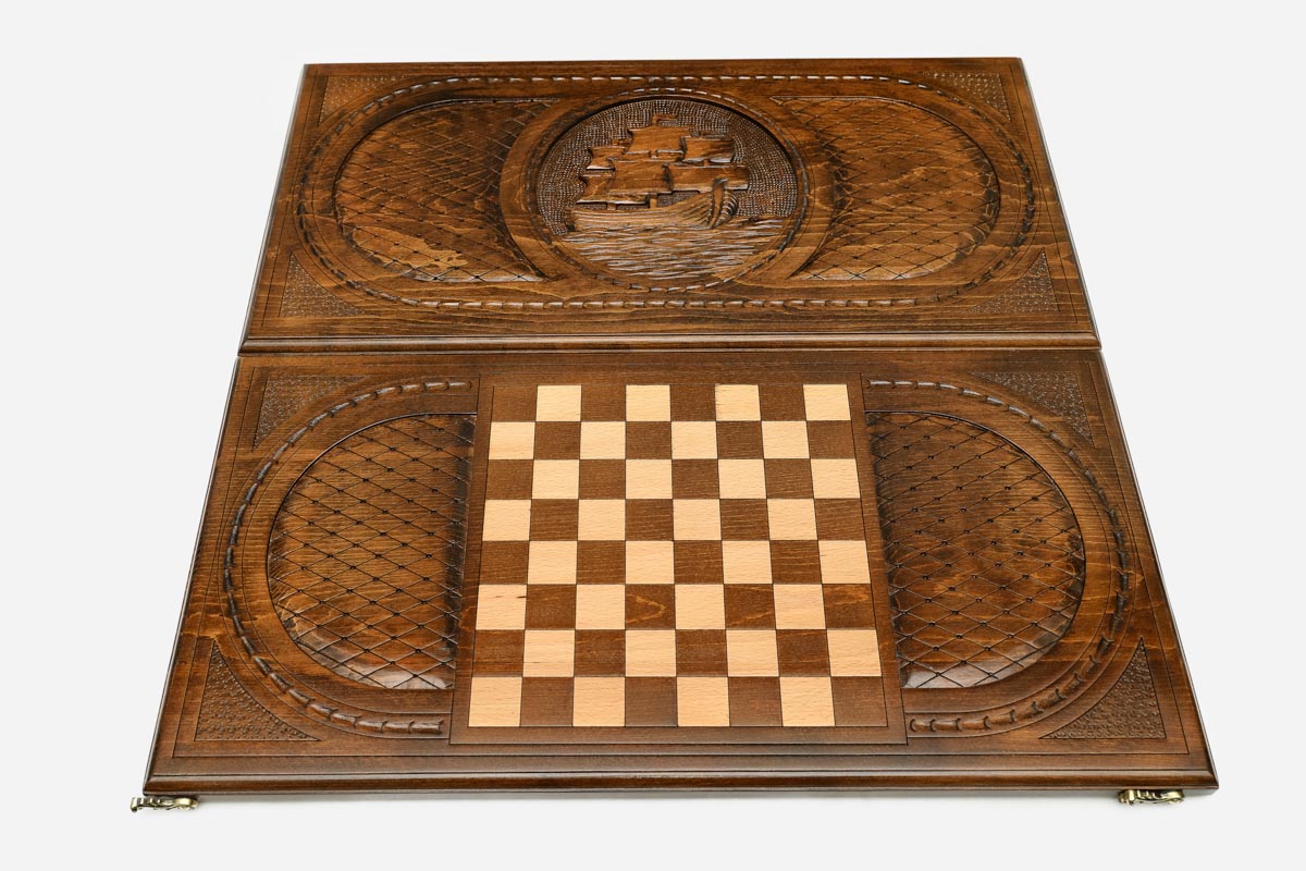 Sailing ship backgammon set folded, carved sails and pennants showing