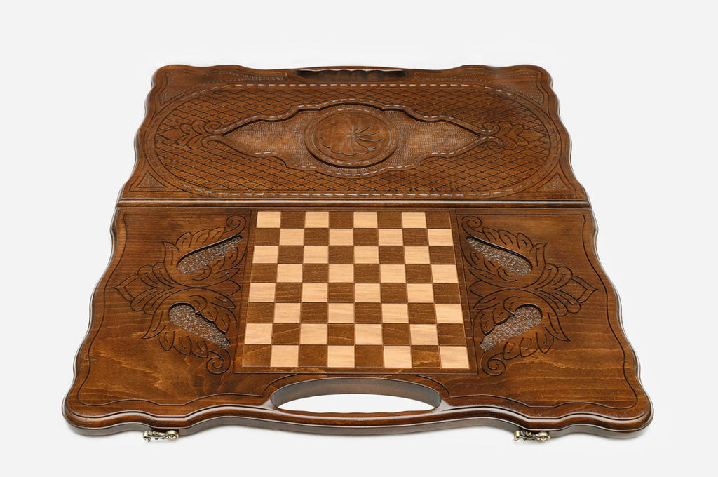 Angled view of the eternity sign carved backgammon board