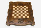St. George and dragon carved on the wooden chessboard