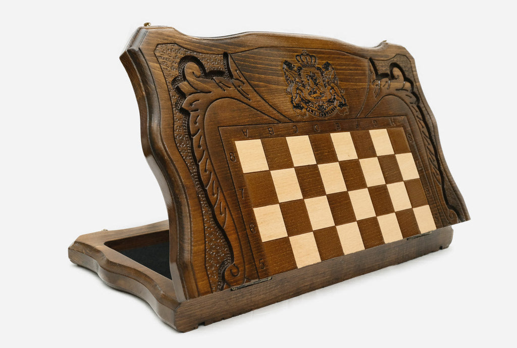 Close-up of the Georgian coat of arms carving on the beech board