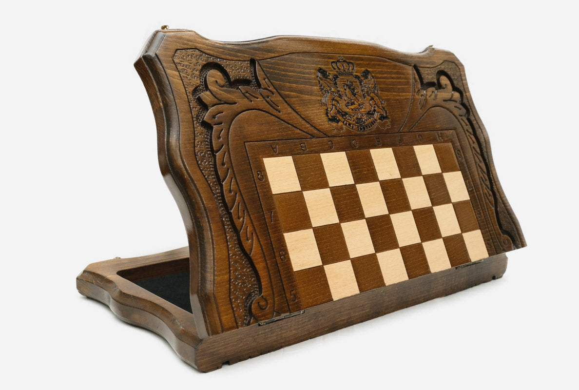 Close-up of the Georgian coat of arms carving on the beech board