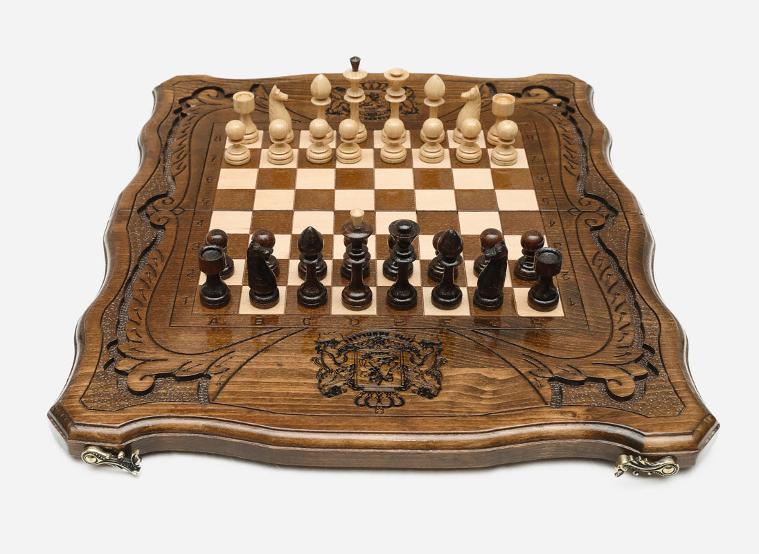 Georgian chess set with the coat of arms carved on the board