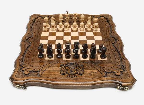 Georgian chess set with the coat of arms carved on the board