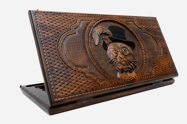 Wooden backgammon set hand carved with a poised cat